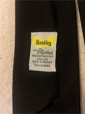 Wembley Black Wool-Mohair Necktie with Yellow Logo Tag